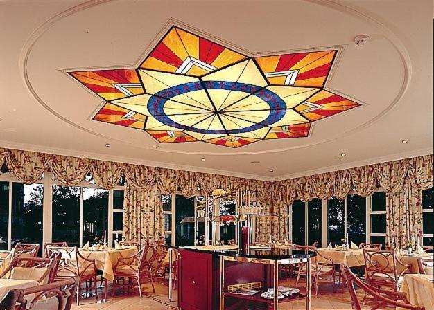 Ein Restaurant oder anderes Speiselokal in der Unterkunft Usedom Palace