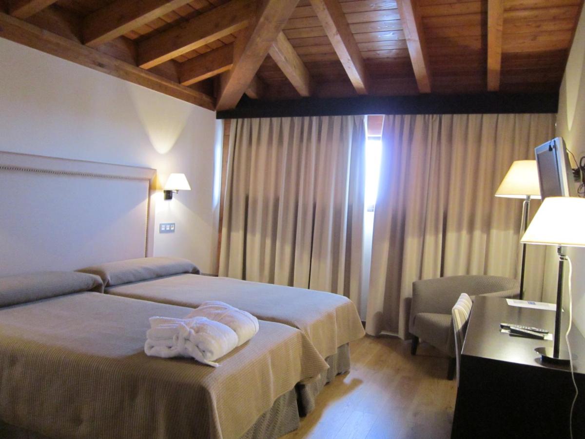 Cama o camas de una habitación en Balneario Cervantes