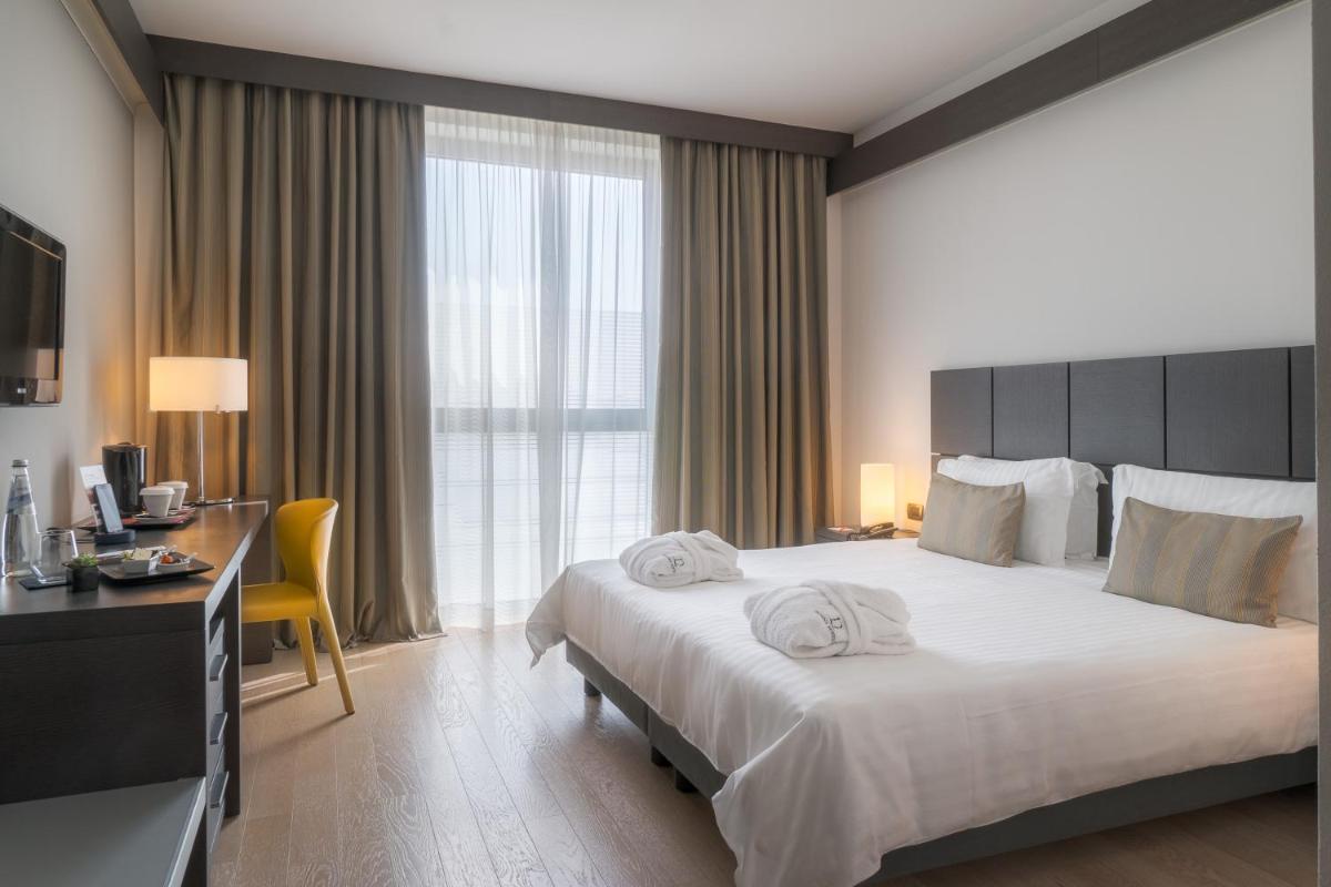 Domina Milano Fiera - Housity