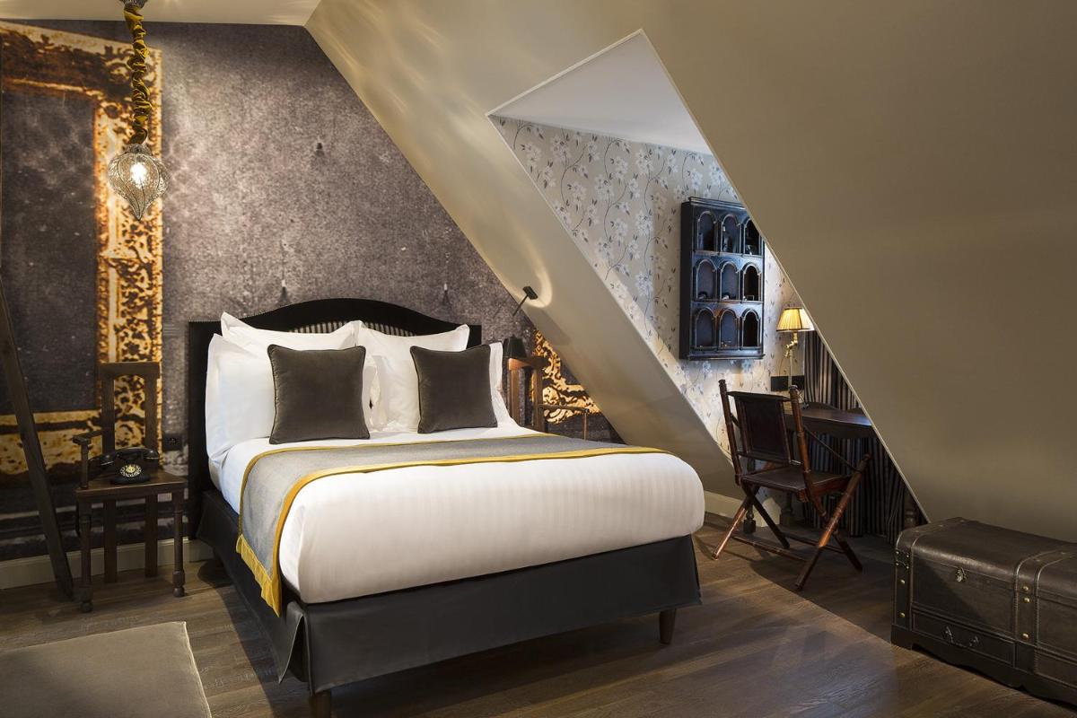 Un ou plusieurs lits dans un hébergement de l'établissement Hôtel Da Vinci & Spa