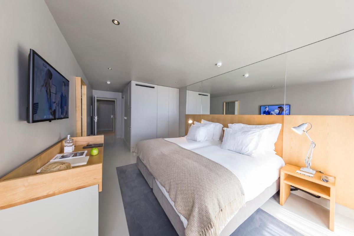 Uma cama ou camas num quarto em Villa C Boutique Hotel