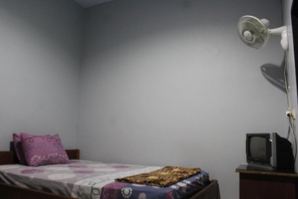 Penginapan Artha - Housity