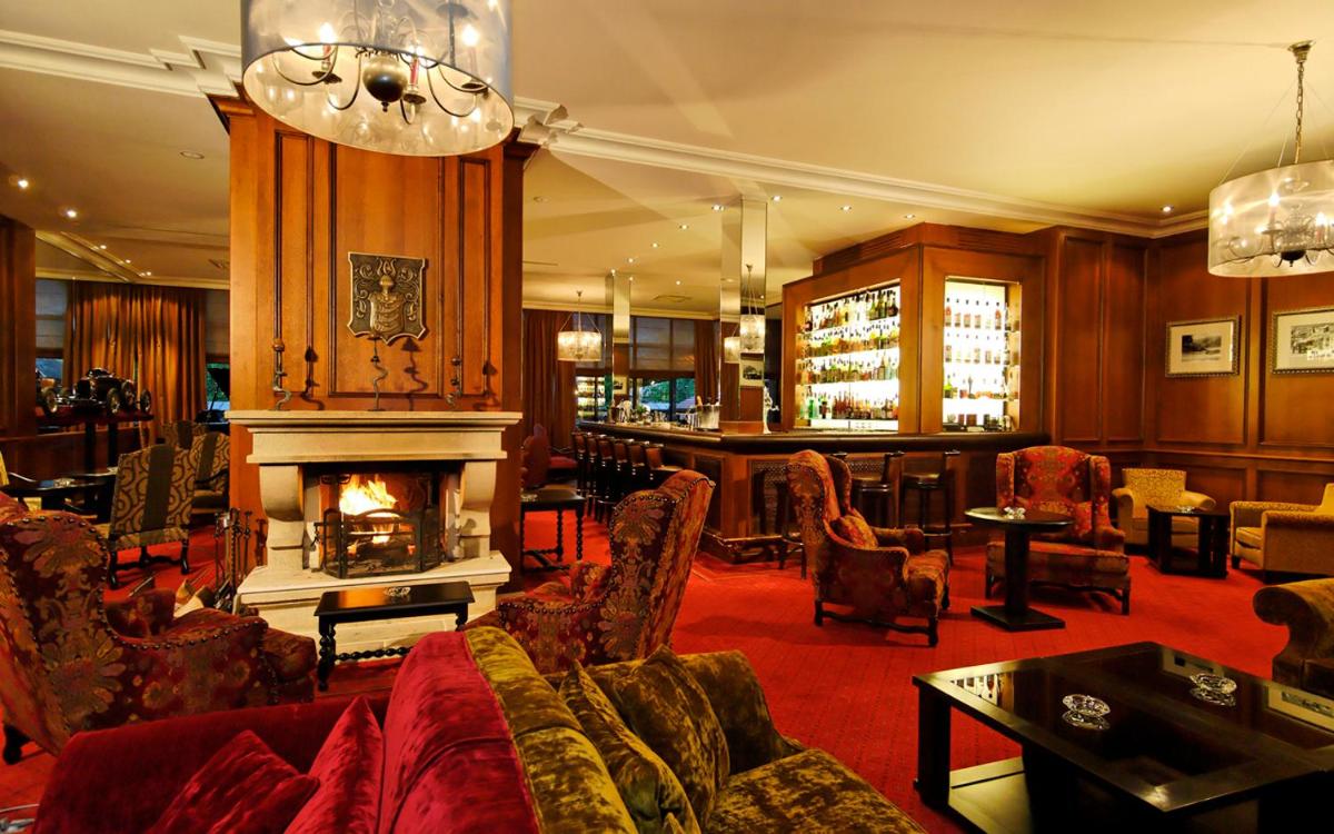 Coin salon dans l'établissement Le Grand Hotel & Spa