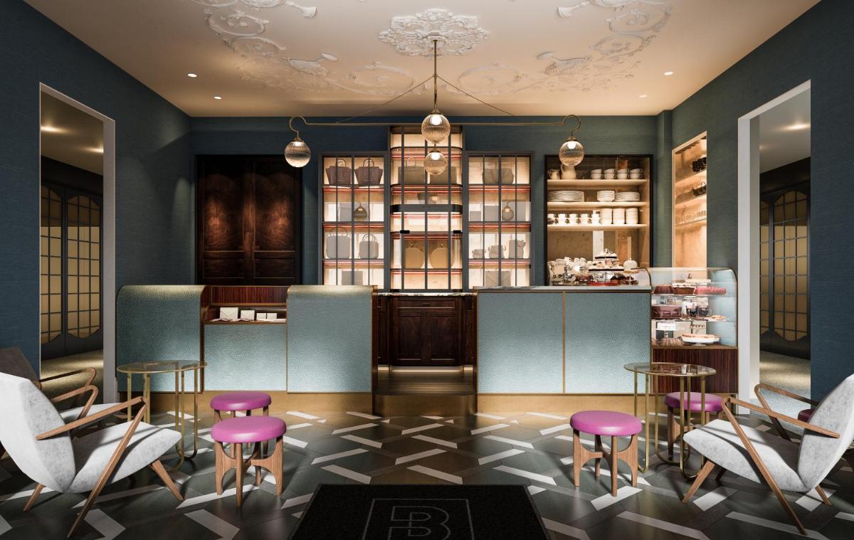 un hall d'entrée avec un bar, des tabourets et un comptoir dans l'établissement Maison Bréguet, à Paris