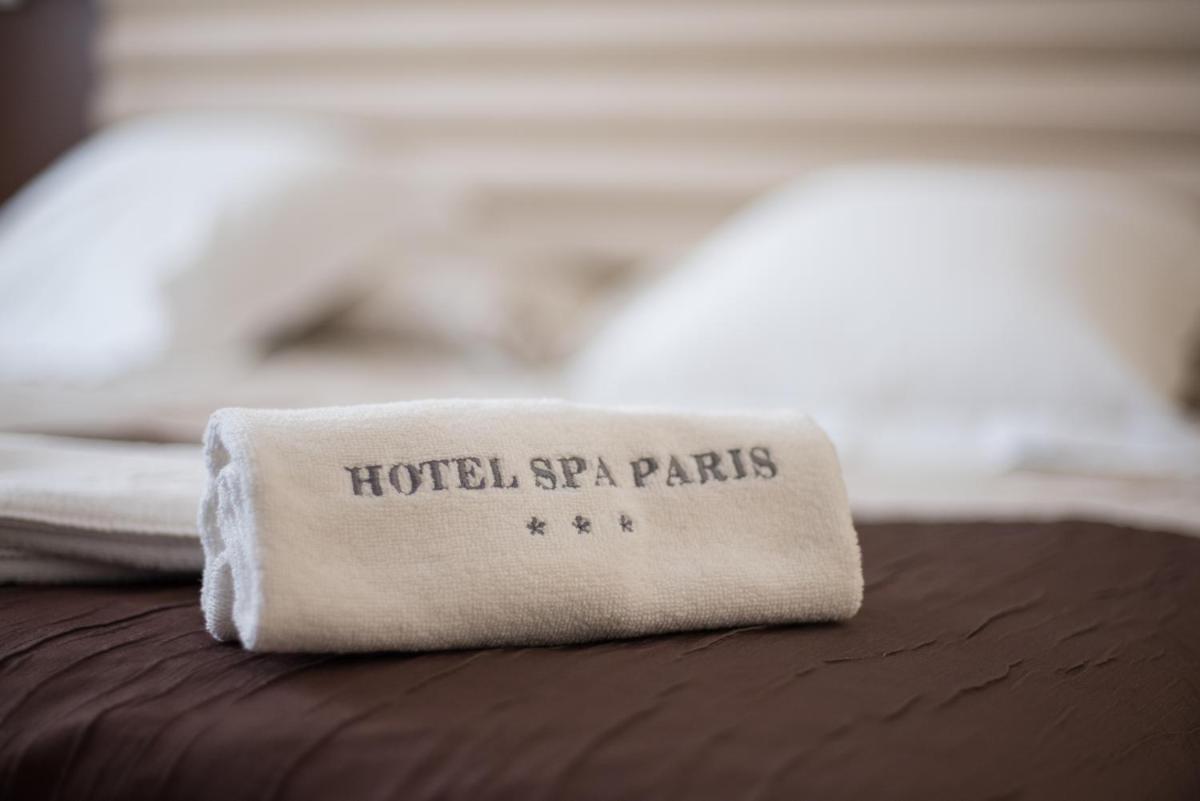 Cama o camas de una habitación en ARVA Spa París