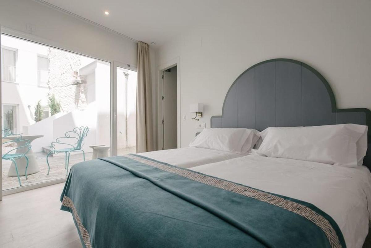 Apartamentos RG Suites Plaza del Salvador - Housity