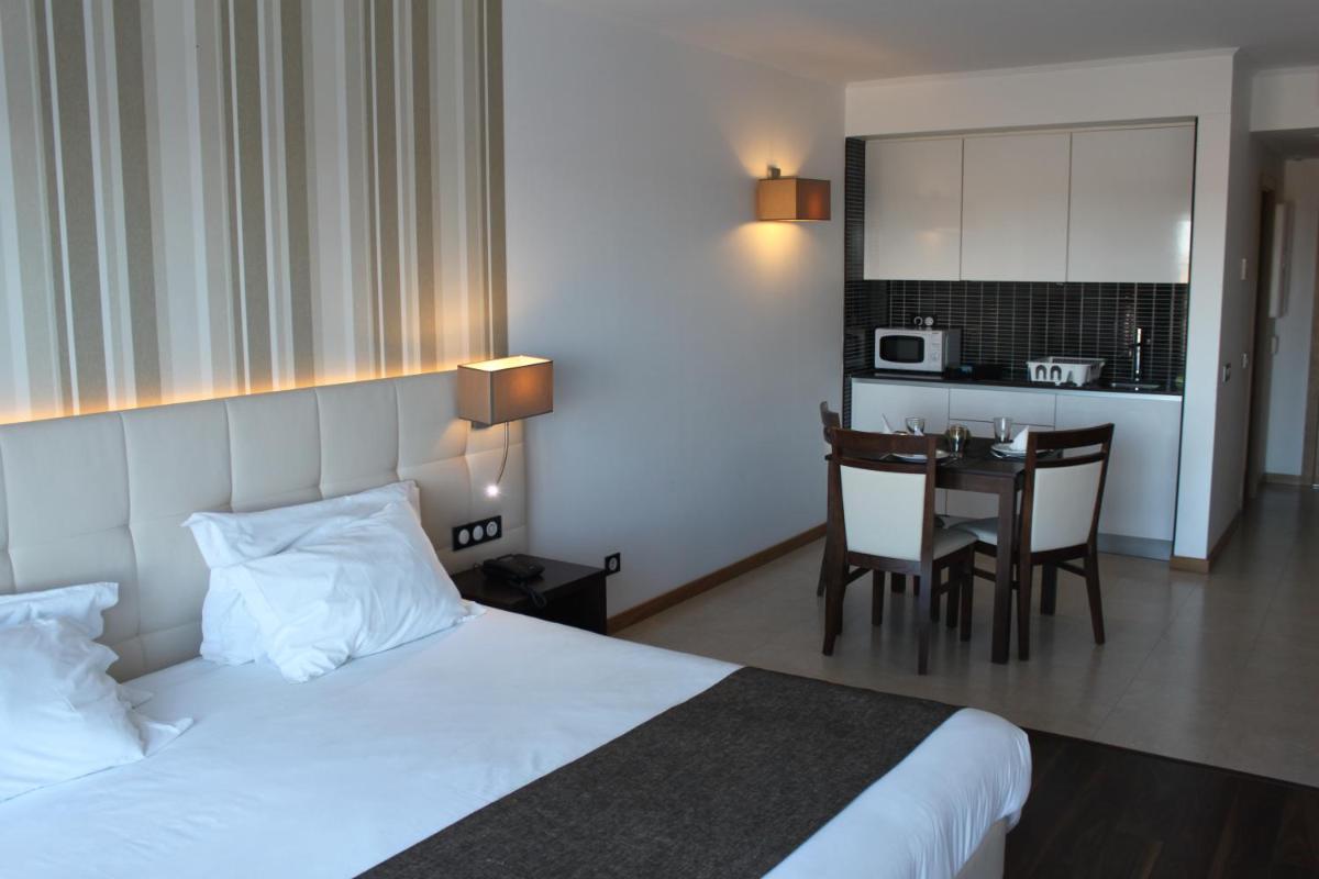 A cozinha ou kitchenette de Hotel O Gato & Spa