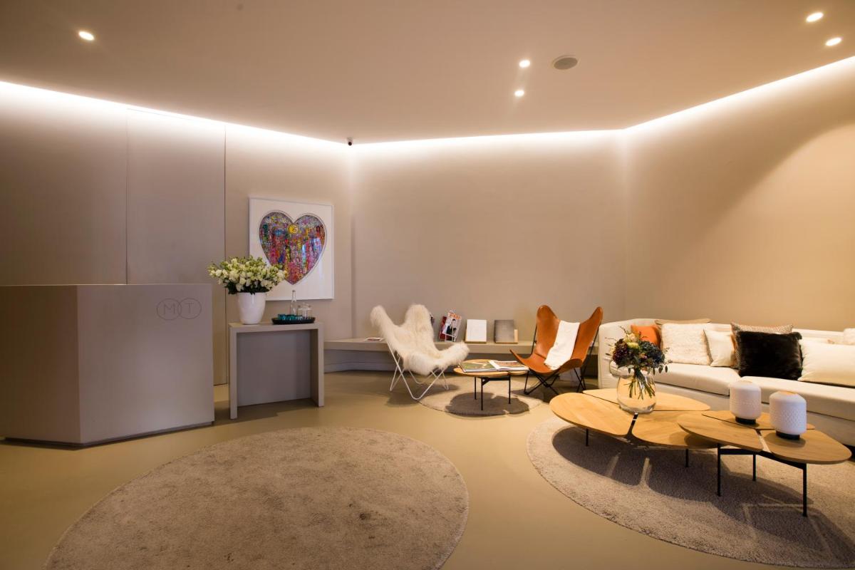 Coin salon dans l'établissement Relais & Châteaux La Maison Des Têtes