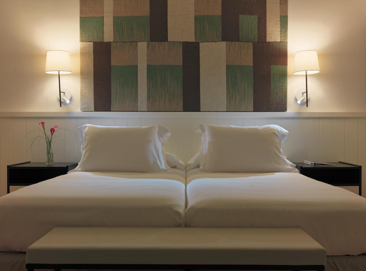 Cama o camas de una habitación en H10 Casa del Mar