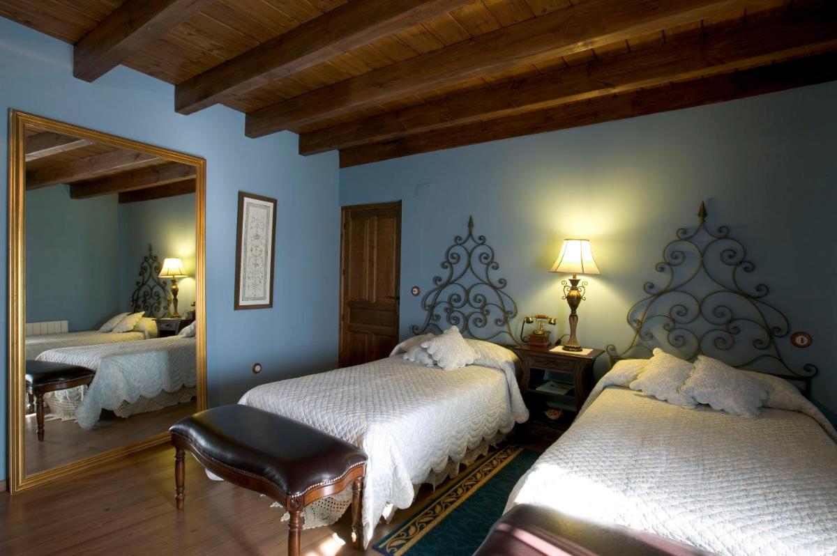 Cama o camas de una habitación en La Posada Del Canal