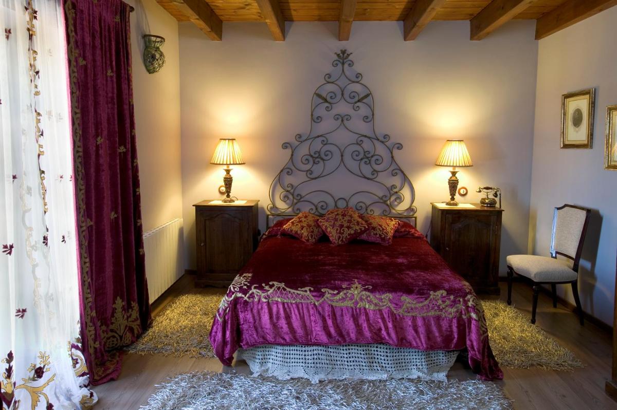 Cama o camas de una habitación en La Posada Del Canal