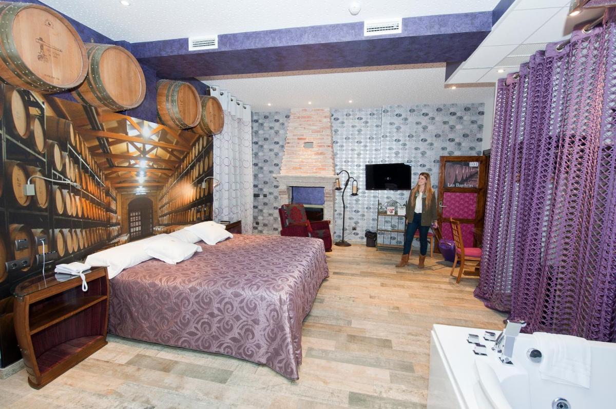 Cama o camas de una habitación en Hotel SPA El Lagar de Isilla