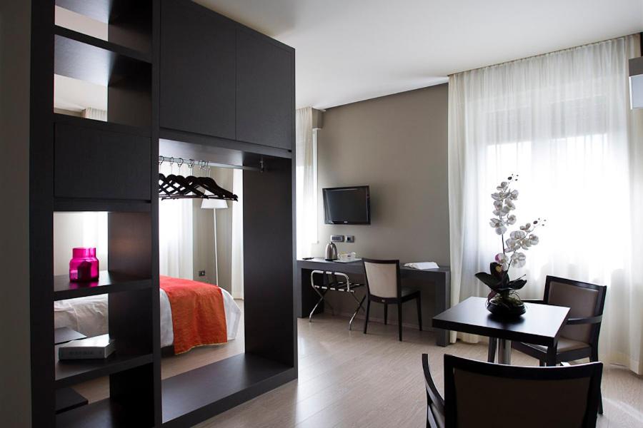 Zara Rooms & Suites - Housity