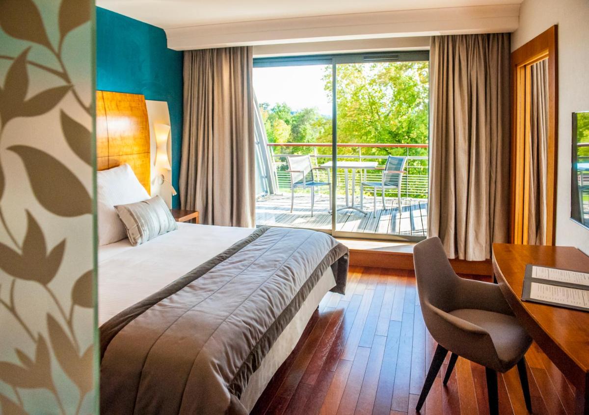 Un ou plusieurs lits dans un hébergement de l'établissement Parc Beaumont Hôtel & Spa Pau - MGallery Collection