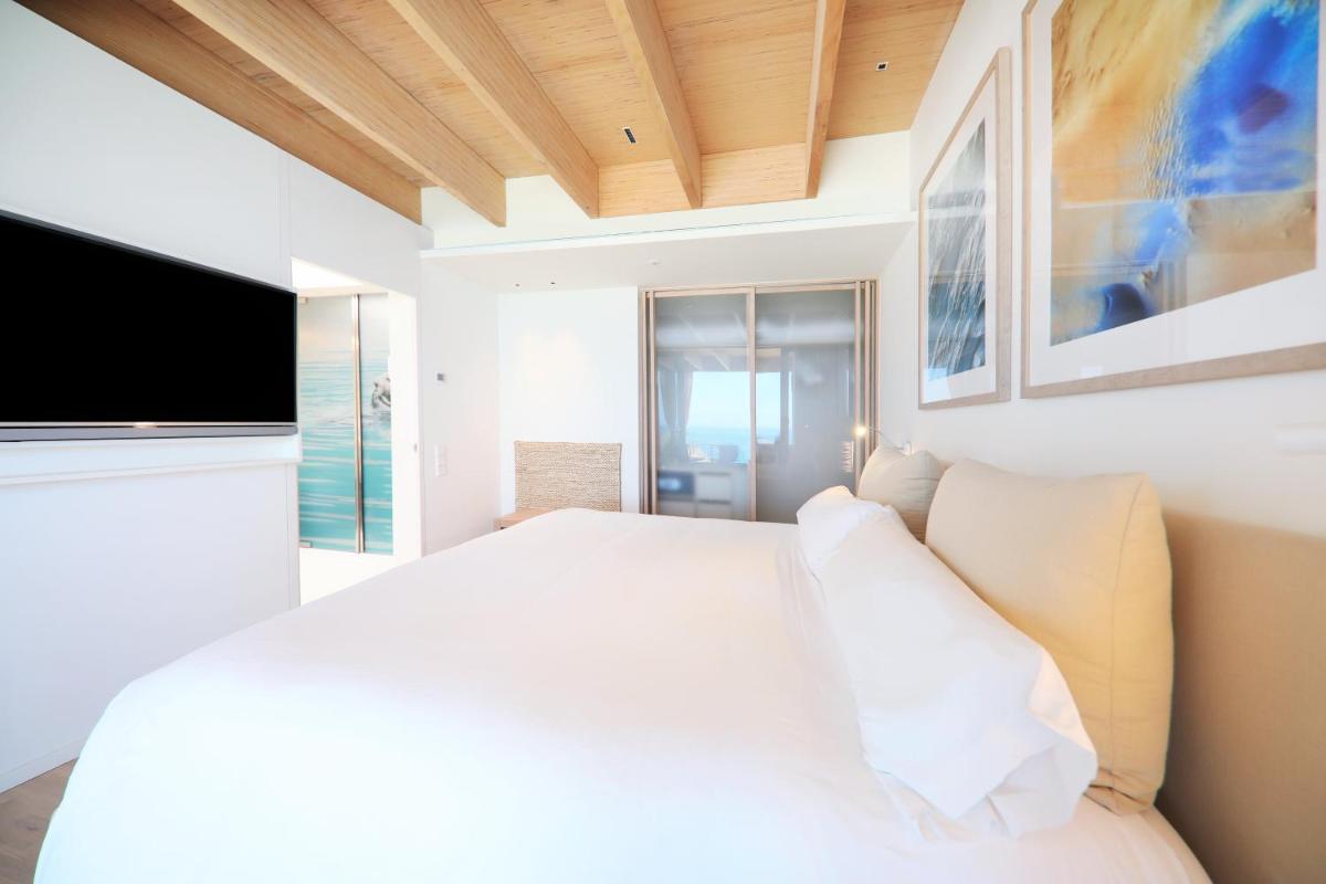 Cama o camas de una habitación en JOIA Salomé by Iberostar -Adults Only