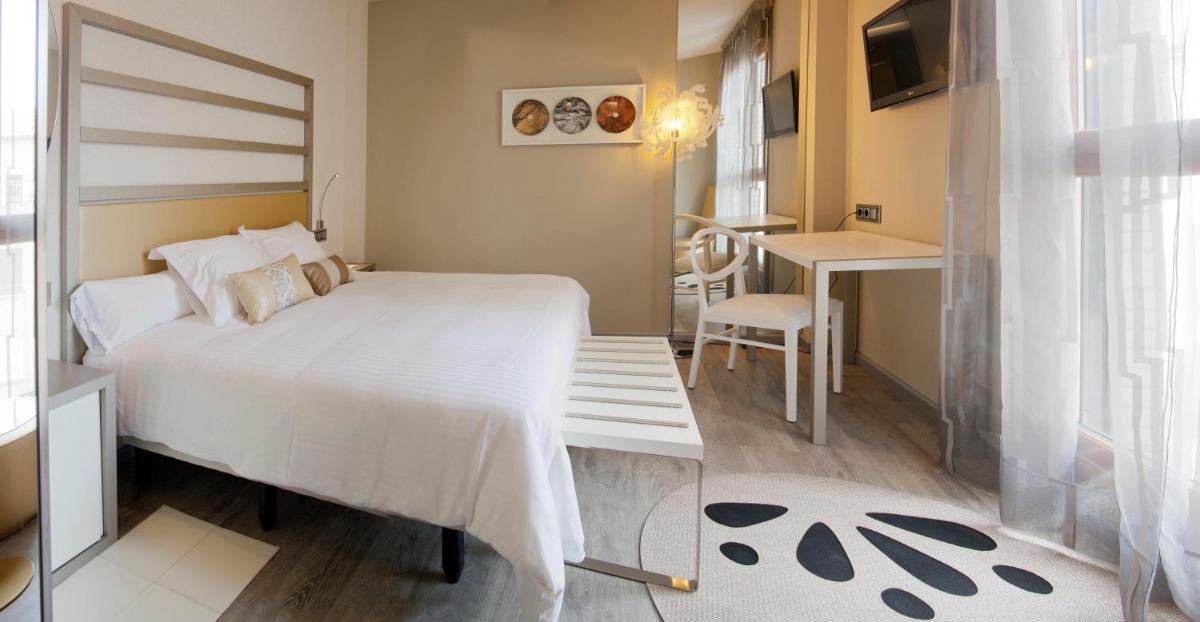 Cama o camas de una habitación en Hotel & Spa Princesa Munia