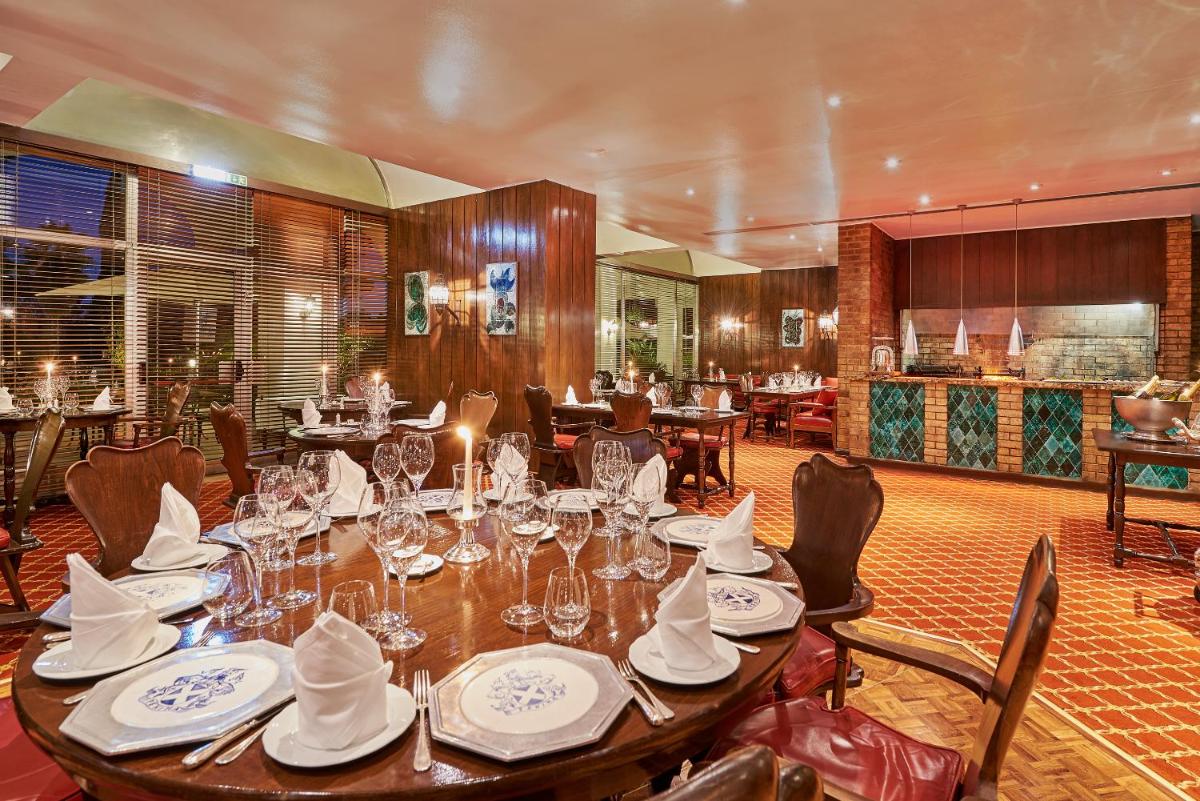 Um restaurante ou outro lugar para comer em Penina Hotel & Golf Resort