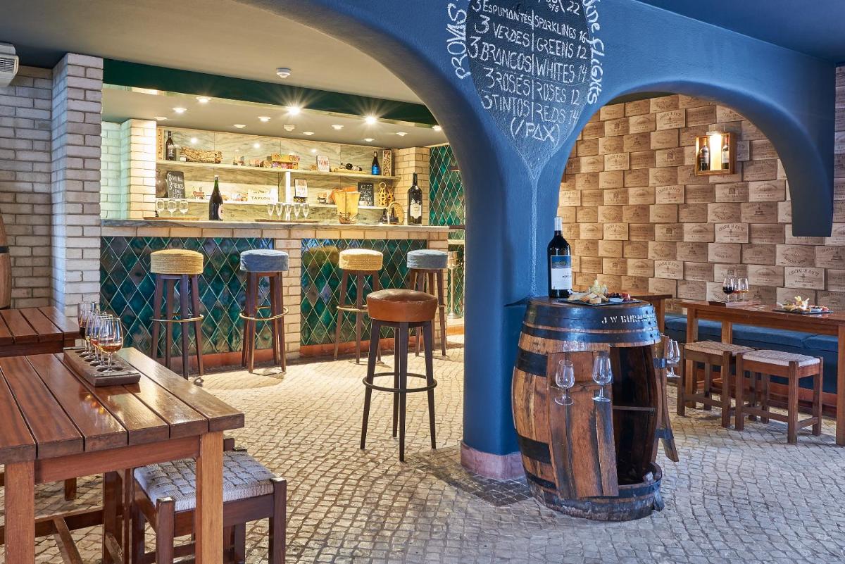 A área de bar ou lounge em Penina Hotel & Golf Resort