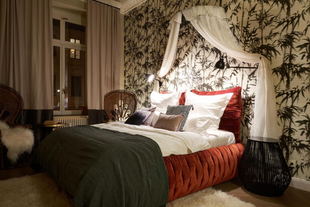 Ein Bett oder Betten in einem Zimmer der Unterkunft Cora Apartments