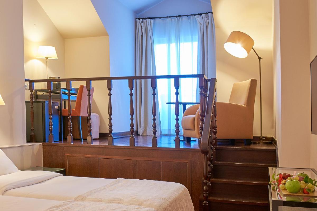 Uma cama ou camas num quarto em Penina Hotel & Golf Resort