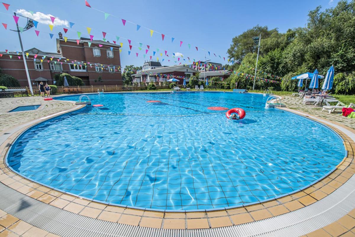 Changchun Clear Moon Apartment by South Lake Hotel - Housity