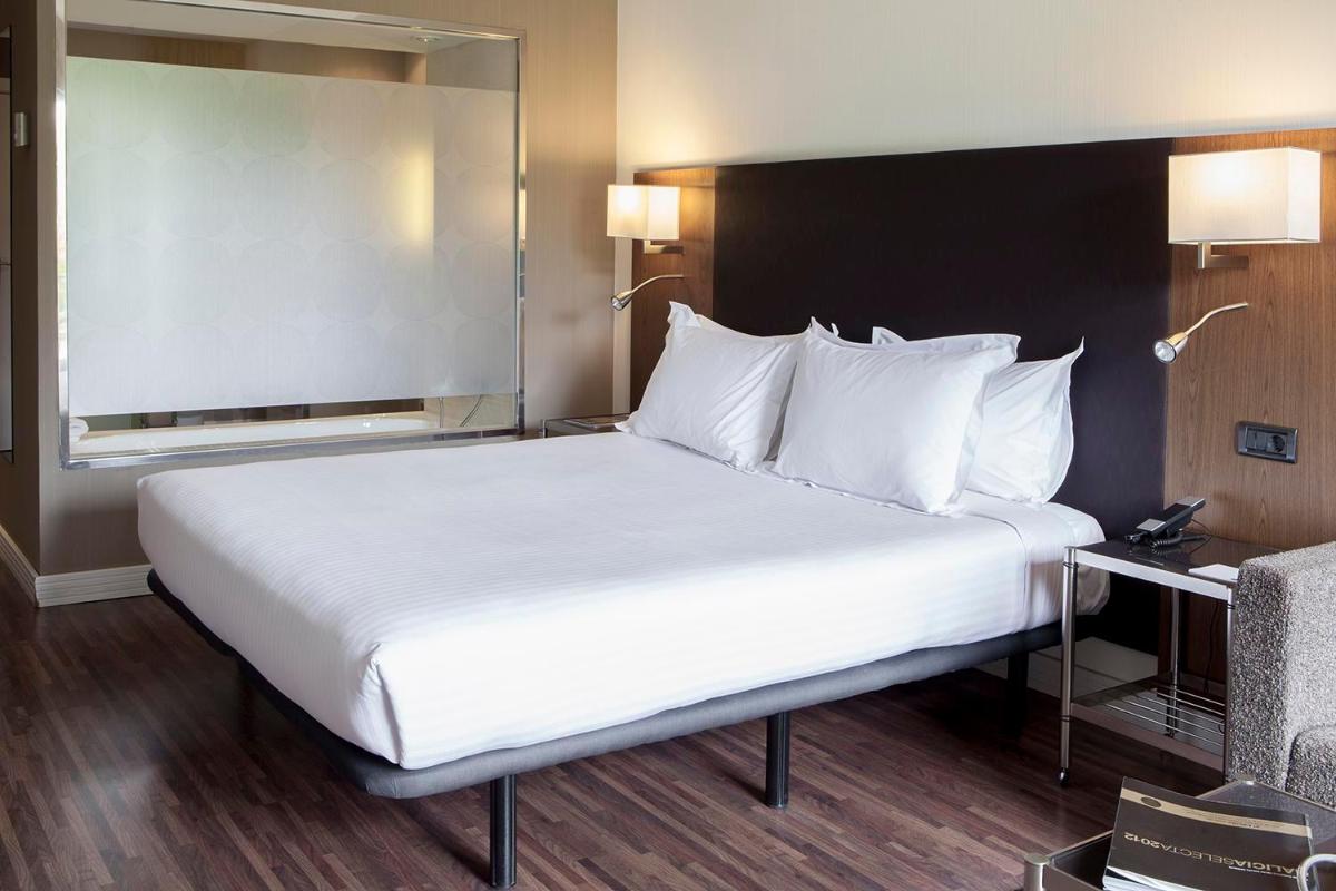 Cama o camas de una habitación en Eurostars Vila de Allariz Hotel Balneario