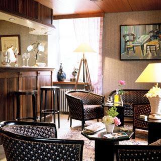 Coin salon dans l'établissement Hôtel Restaurant Taillard
