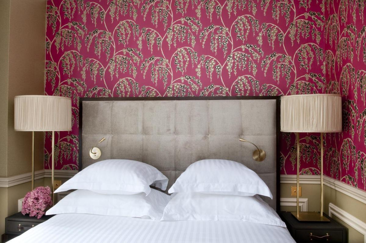 Un ou plusieurs lits dans un hébergement de l'établissement Hôtel de Sèze & Spa Bordeaux Centre