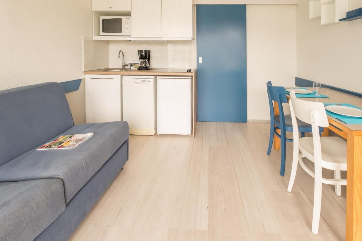 Cuisine ou kitchenette dans l'établissement Résidence Pierre & Vacances la Corniche de la Plage