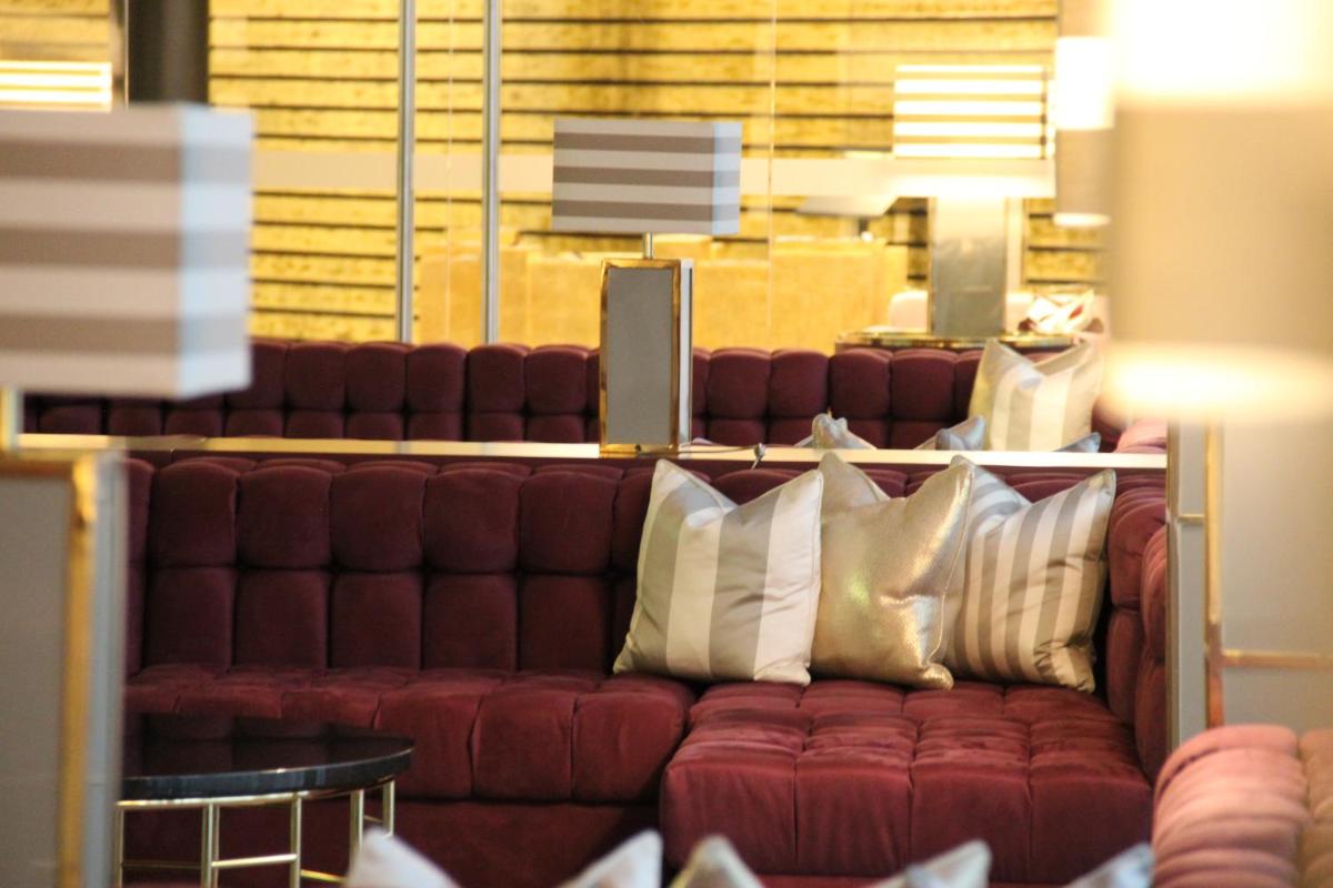 Uma área de estar em Aurea Fatima Hotel Congress & Spa