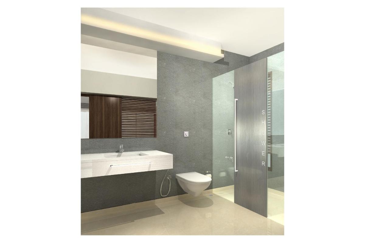 a bathroom with a toilet and a sink and a shower at Svenska Design Hotel in Mumbai