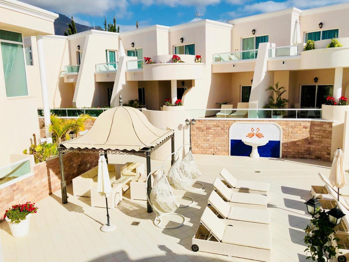Un balcón o terraza de Flamingo Suites Boutique Hotel