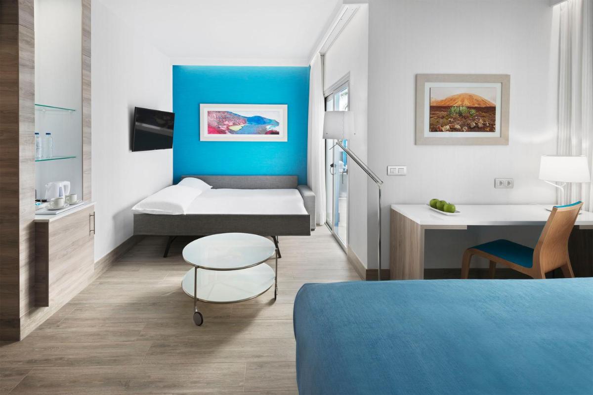 Cama o camas de una habitación en Elba Lanzarote Royal Village Resort