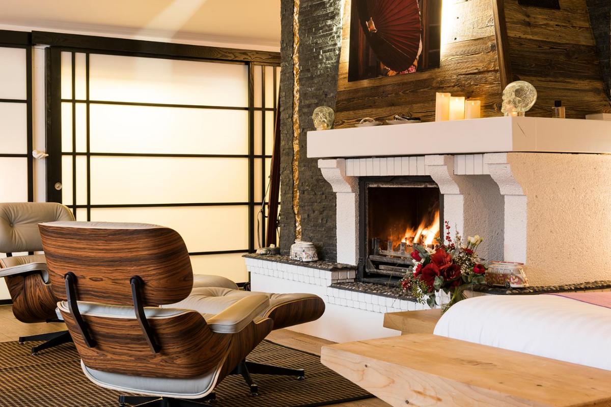 Coin salon dans l'établissement Snow Lodge Hotel Courchevel 1850