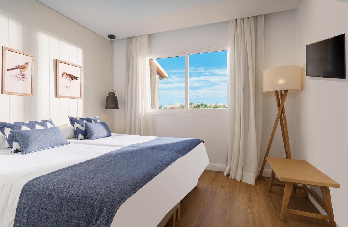 Cama o camas de una habitación en Club del Sol Aparthotel