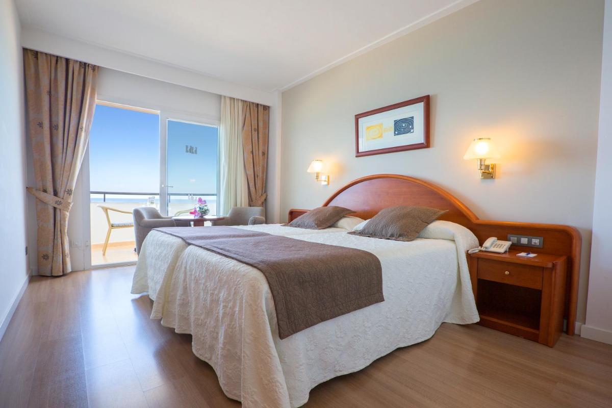 Cama o camas de una habitación en Hipotels Hipocampo Playa