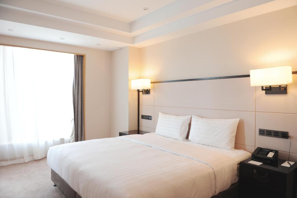 Pullman Qingdao Ziyue - Housity