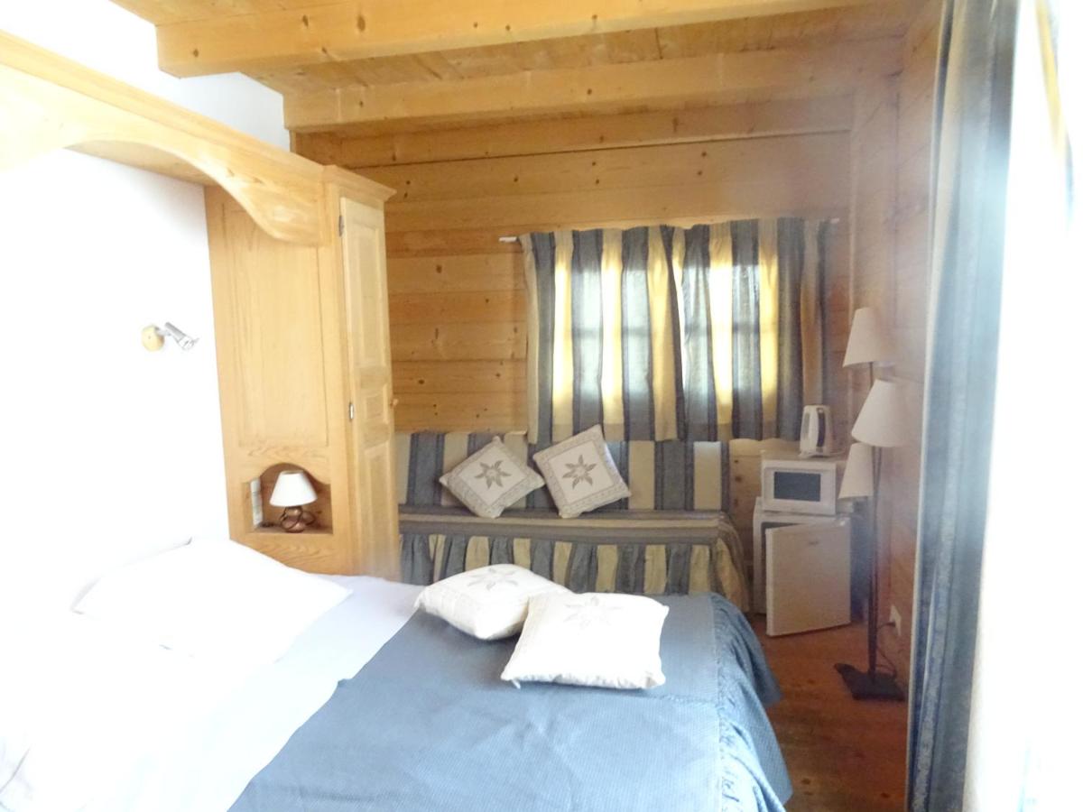 Un ou plusieurs lits dans un hébergement de l'établissement Apart'hotel & Spa "La Destière"
