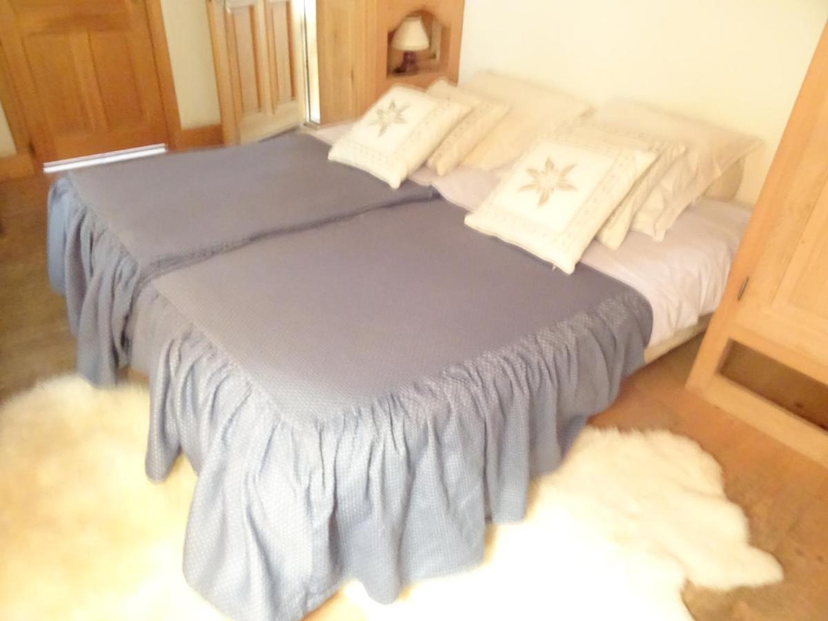 Un ou plusieurs lits dans un hébergement de l'établissement Apart'hotel & Spa "La Destière"
