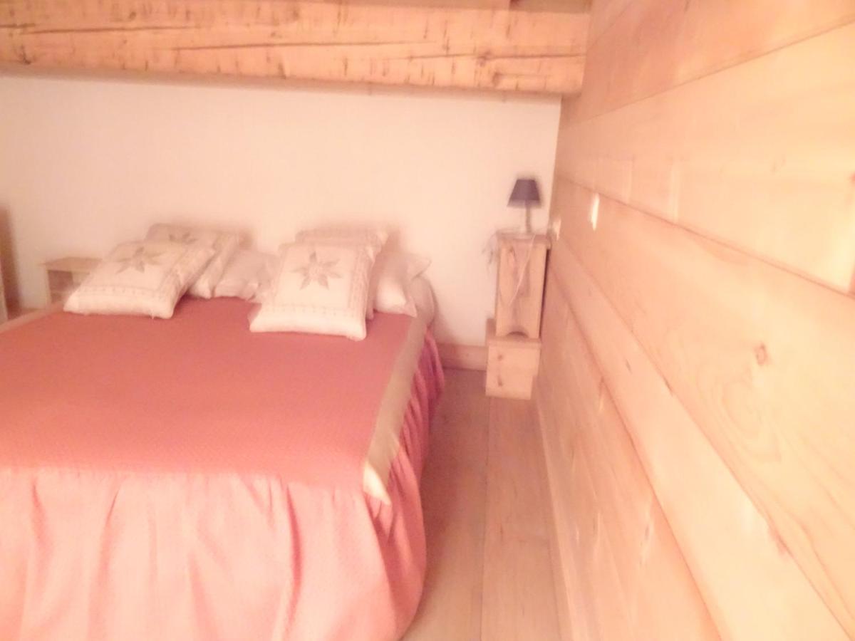 Un ou plusieurs lits dans un hébergement de l'établissement Apart'hotel & Spa "La Destière"