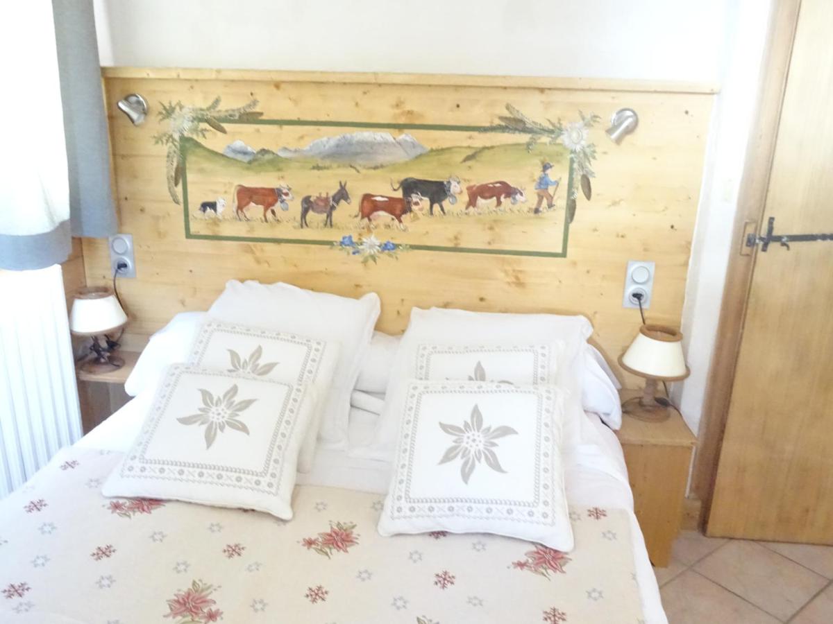 Un ou plusieurs lits dans un hébergement de l'établissement Apart'hotel & Spa "La Destière"