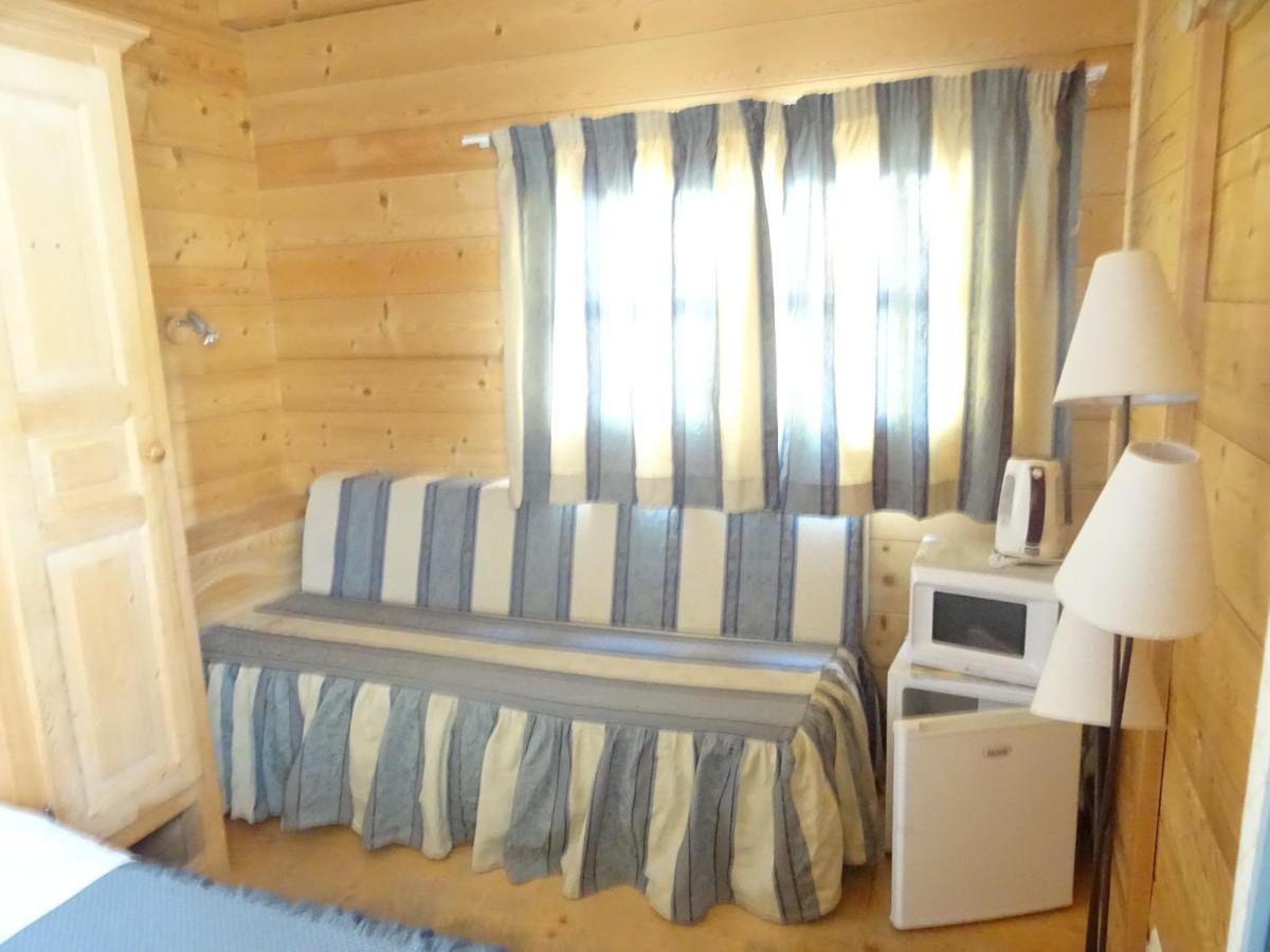 Un ou plusieurs lits dans un hébergement de l'établissement Apart'hotel & Spa "La Destière"