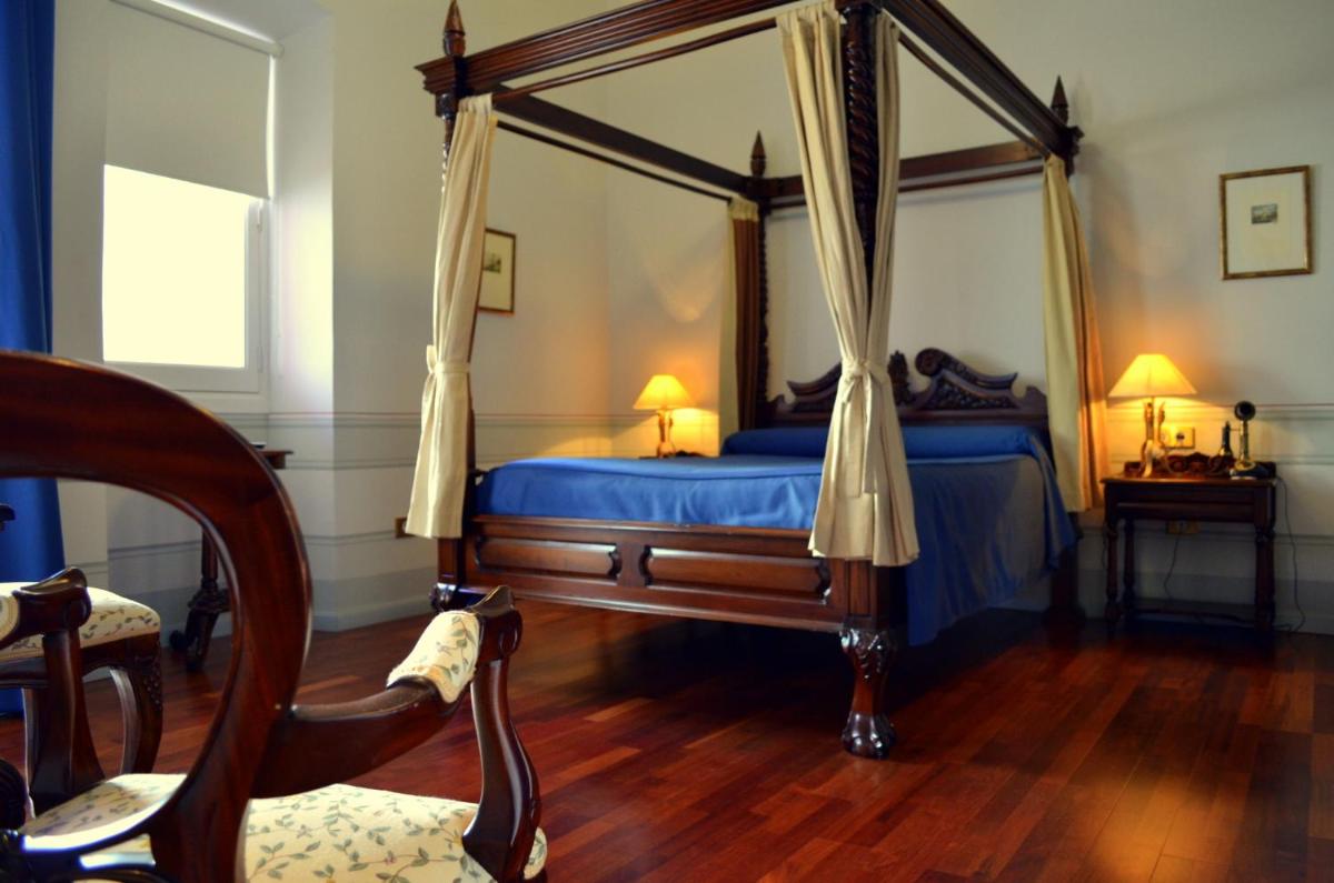 Cama o camas de una habitación en Hotel Mirador de Llerena