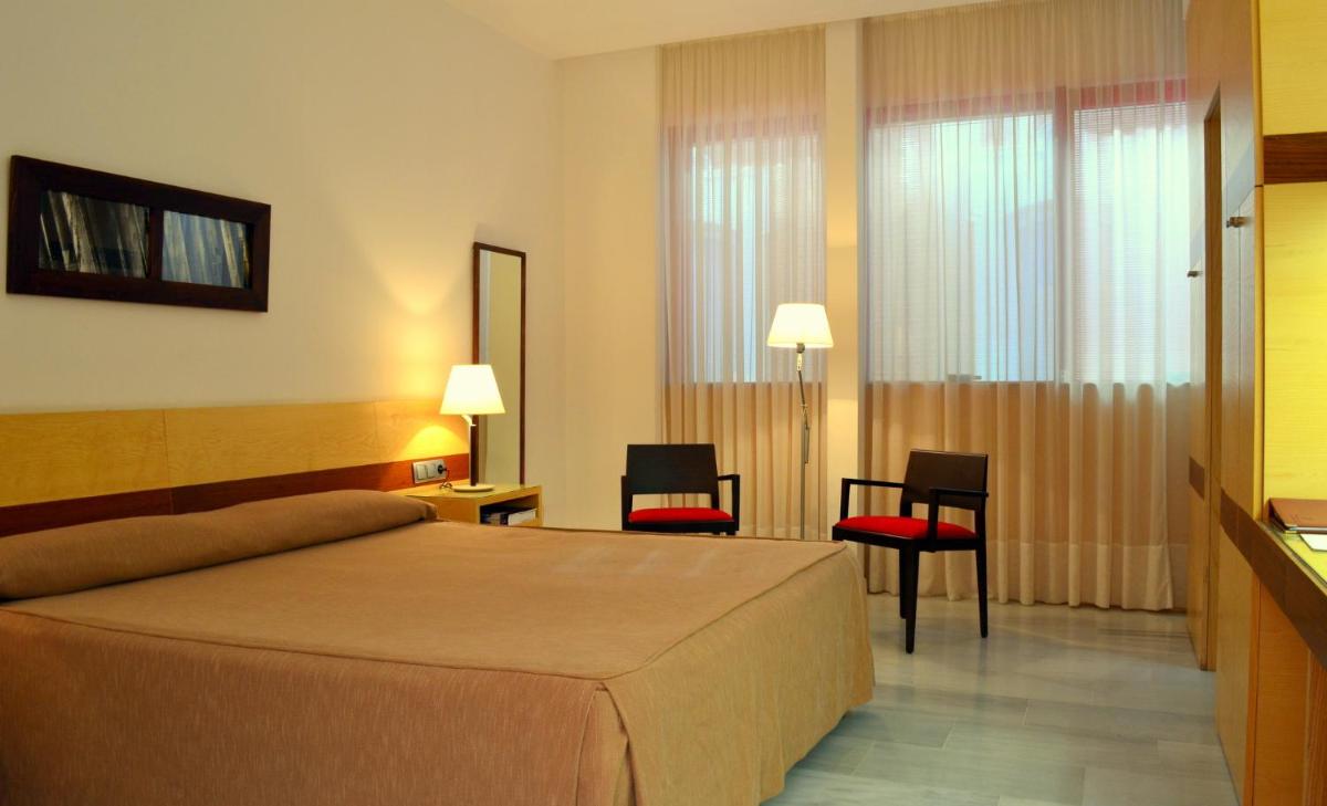 Cama o camas de una habitación en Hotel Mirador de Llerena