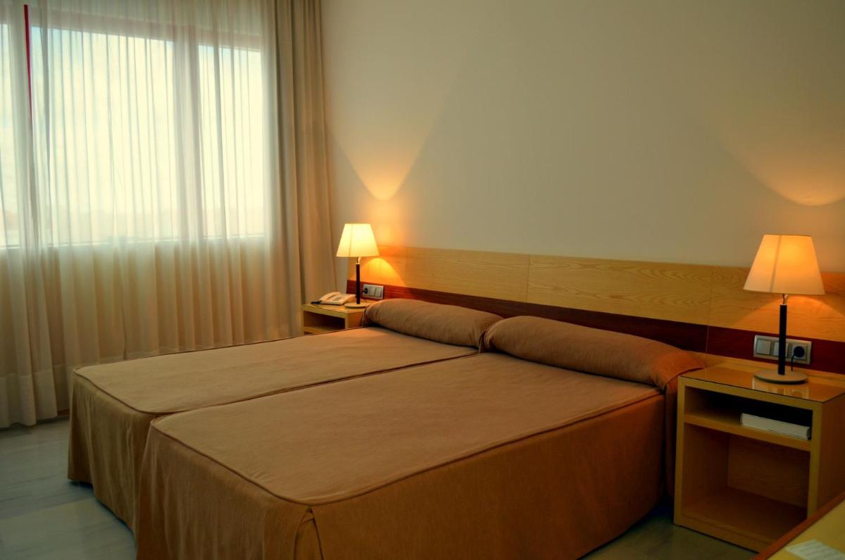 Cama o camas de una habitación en Hotel Mirador de Llerena