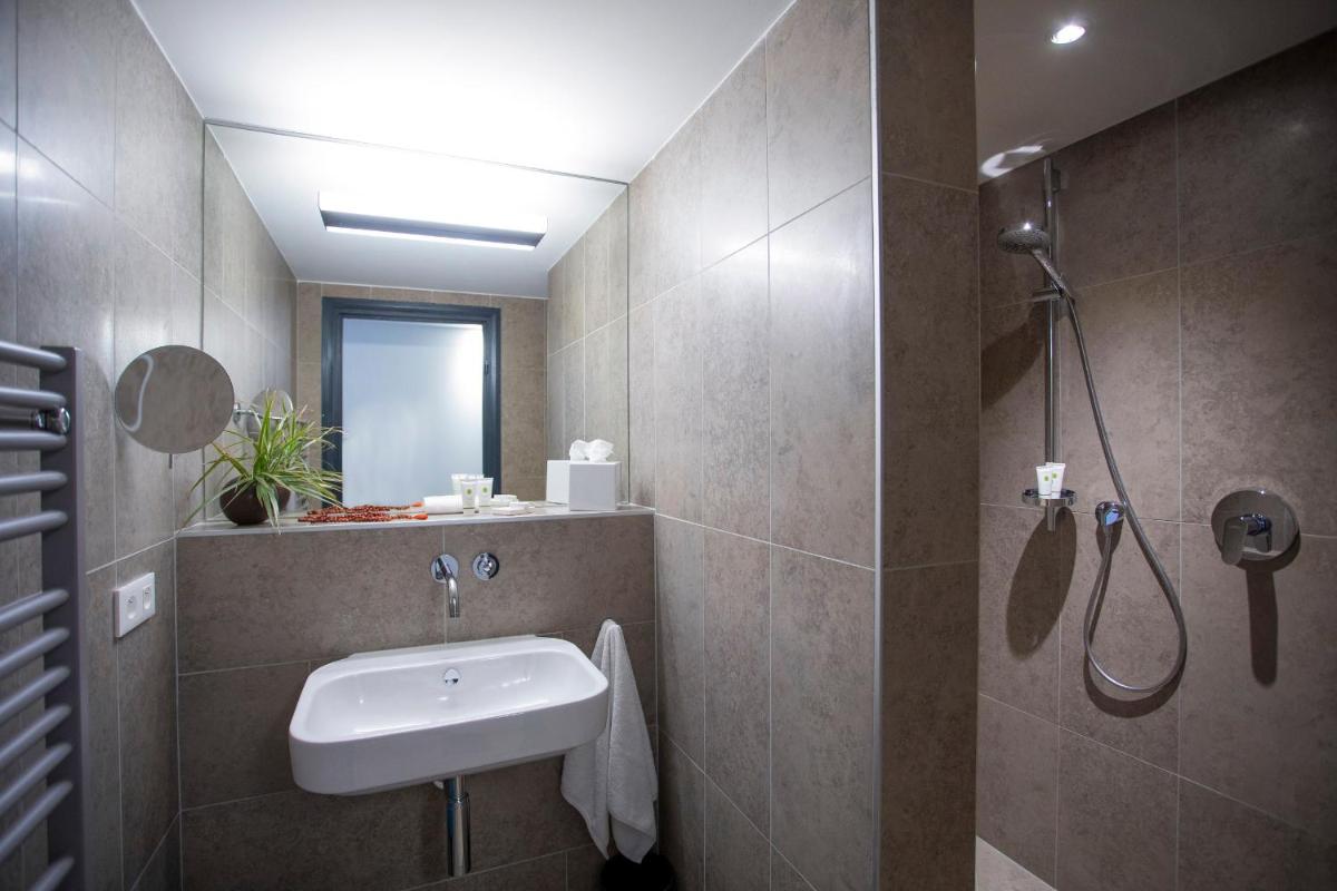 Salle de bains dans l'établissement Fourvière Hôtel