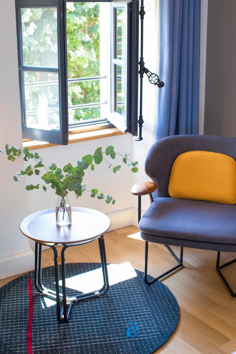Coin salon dans l'établissement Fourvière Hôtel