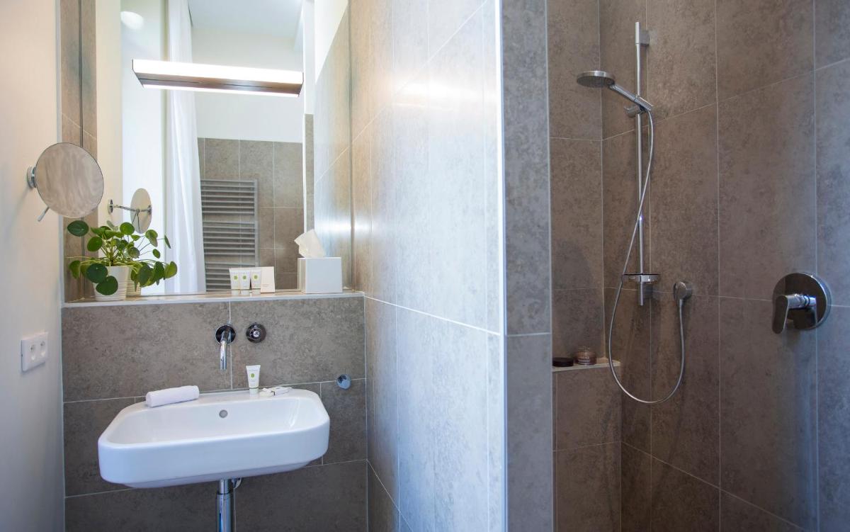 Salle de bains dans l'établissement Fourvière Hôtel