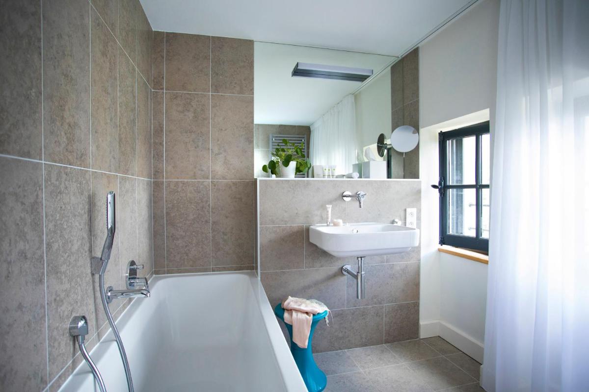 Salle de bains dans l'établissement Fourvière Hôtel