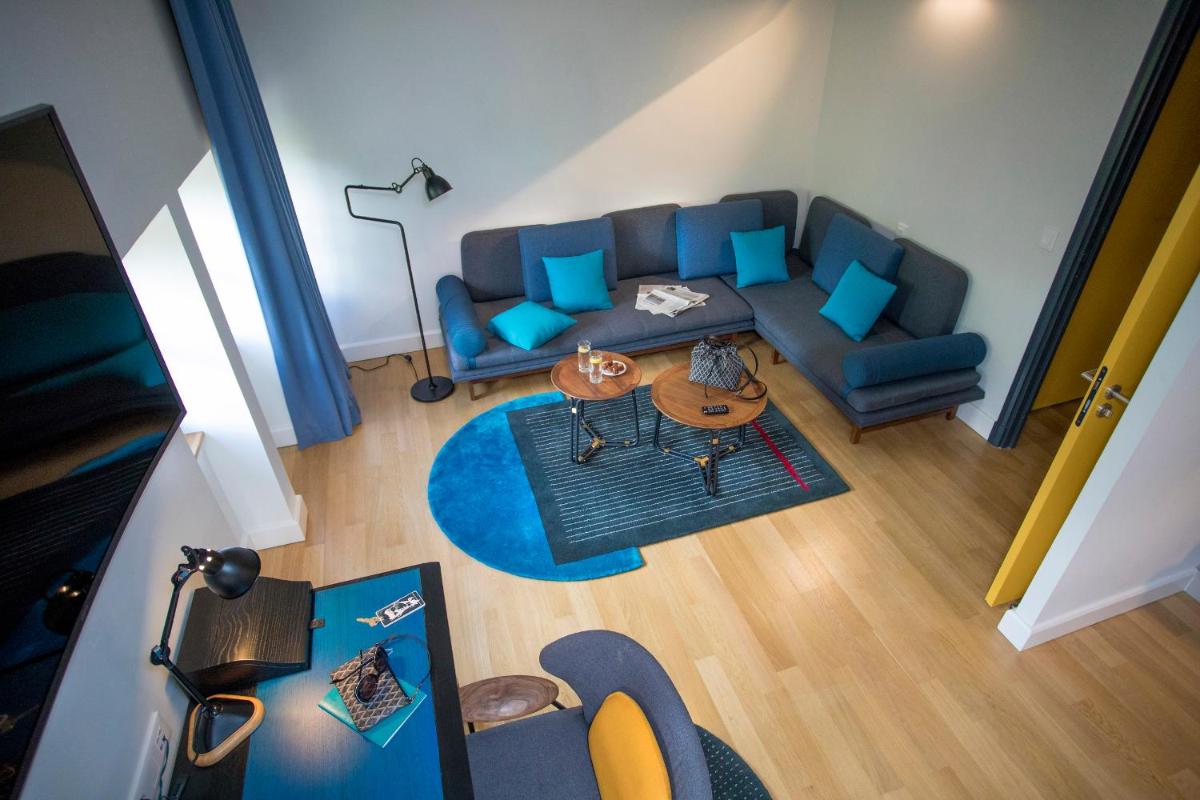 Coin salon dans l'établissement Fourvière Hôtel